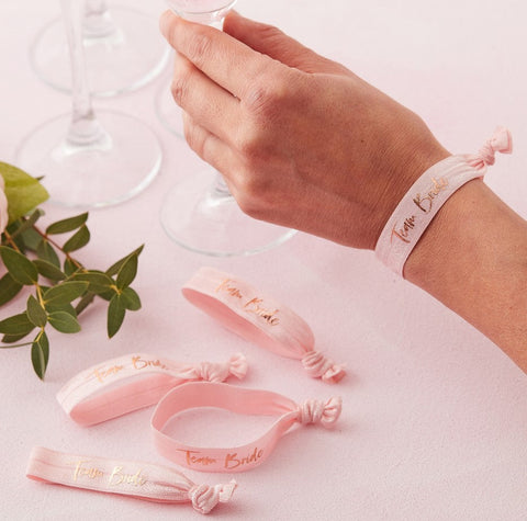 Pale pink hen party wrist bands