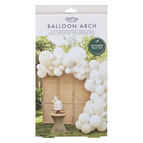 Nude and white balloon decorating arch kit with palm spear fans